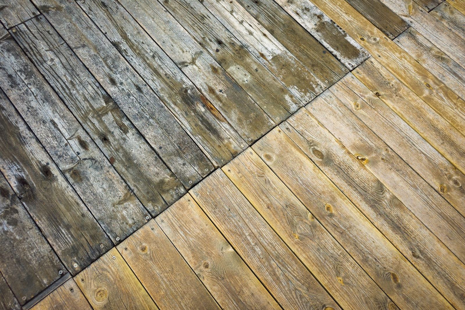 Weathered wood deck boards before cleaning and brightening