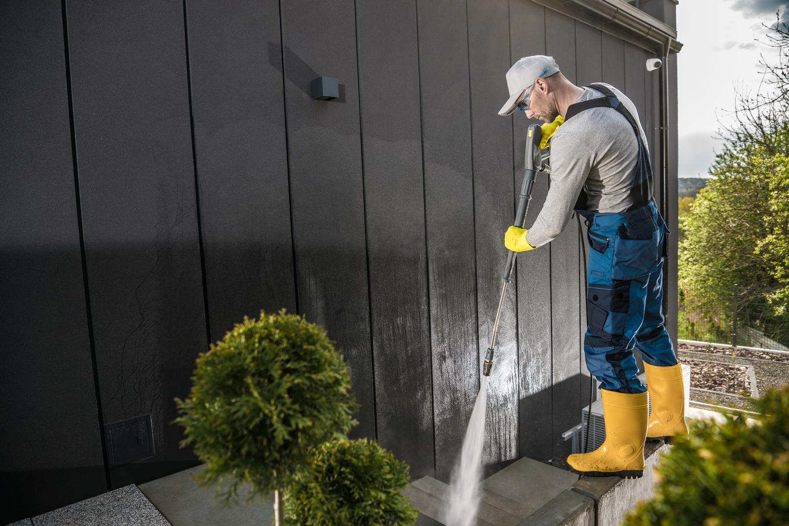 Soft washing the exterior wall of a Richmond home